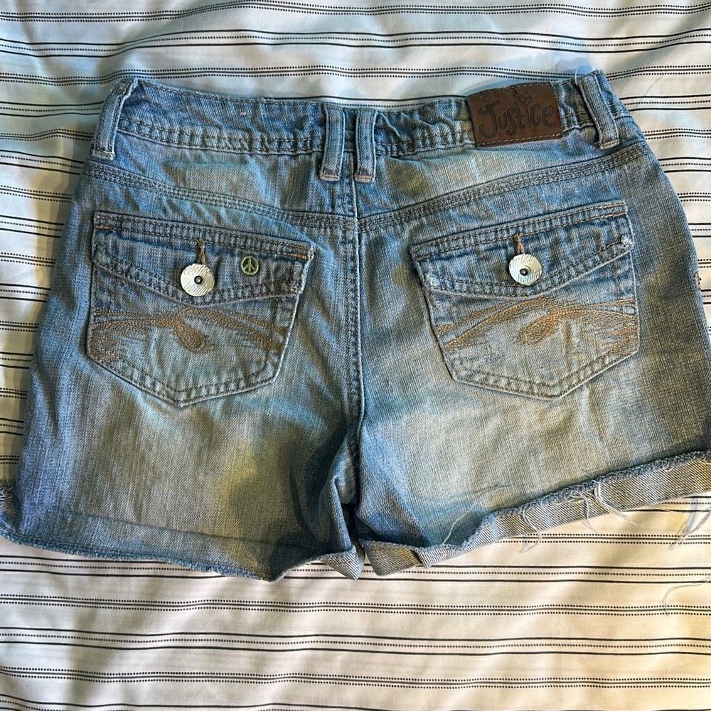 Justice Denim Shorts with Peace Signs. Waist: 24 inches